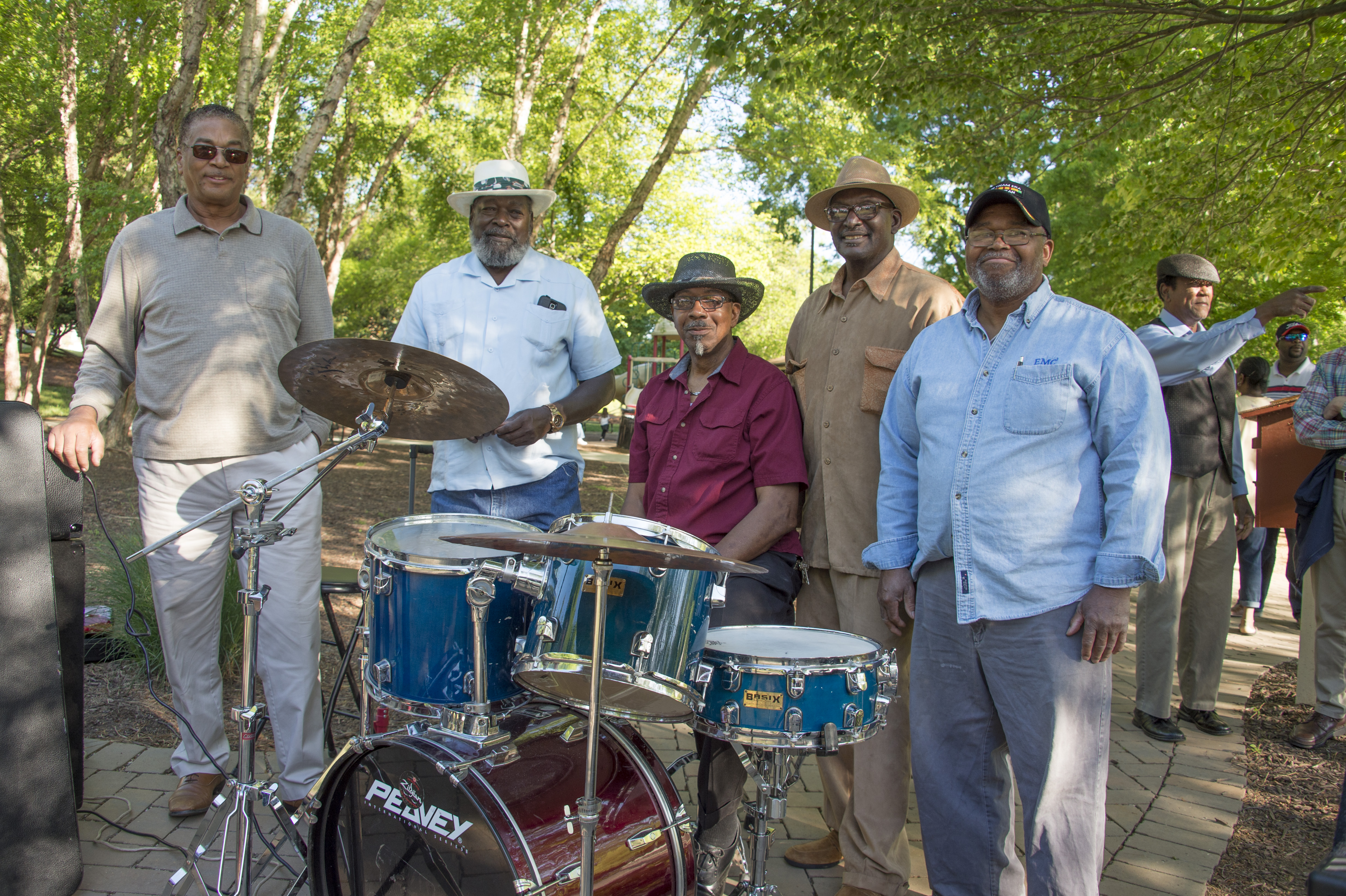 Band members performing at a community event