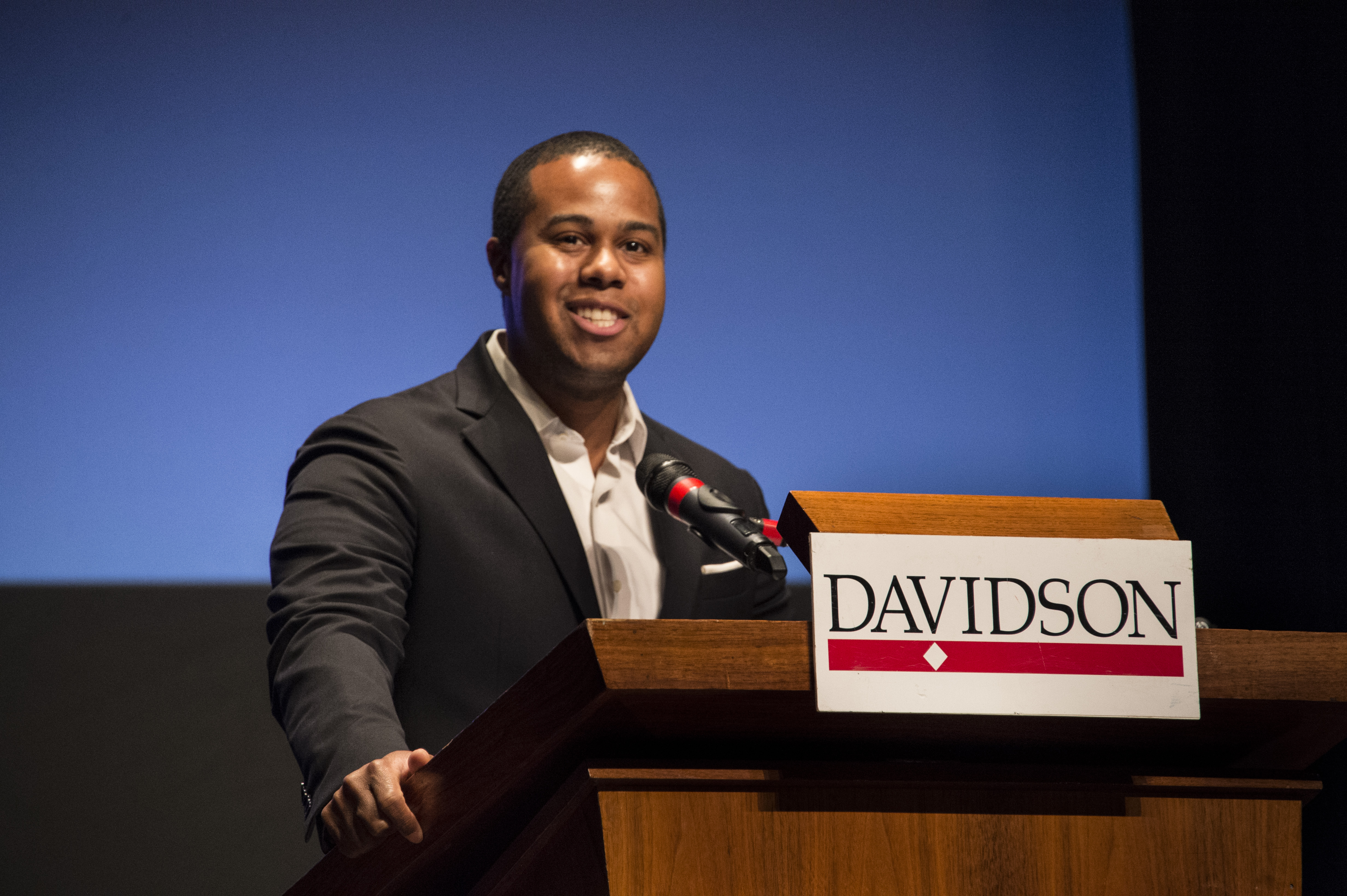 Speaker at a Davidson College podium