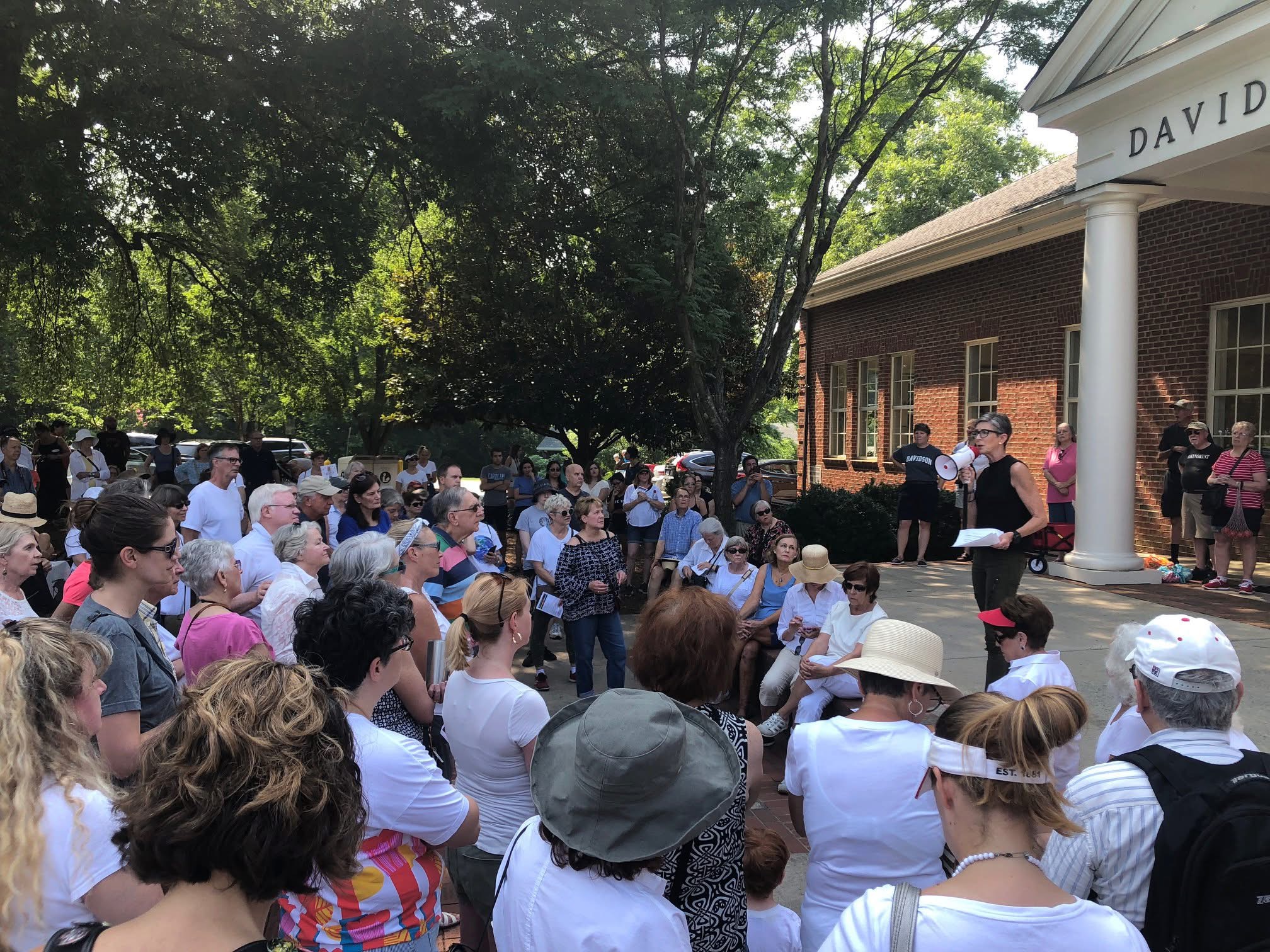 Large crowd gathered at Davidson Town Hall for a community rally