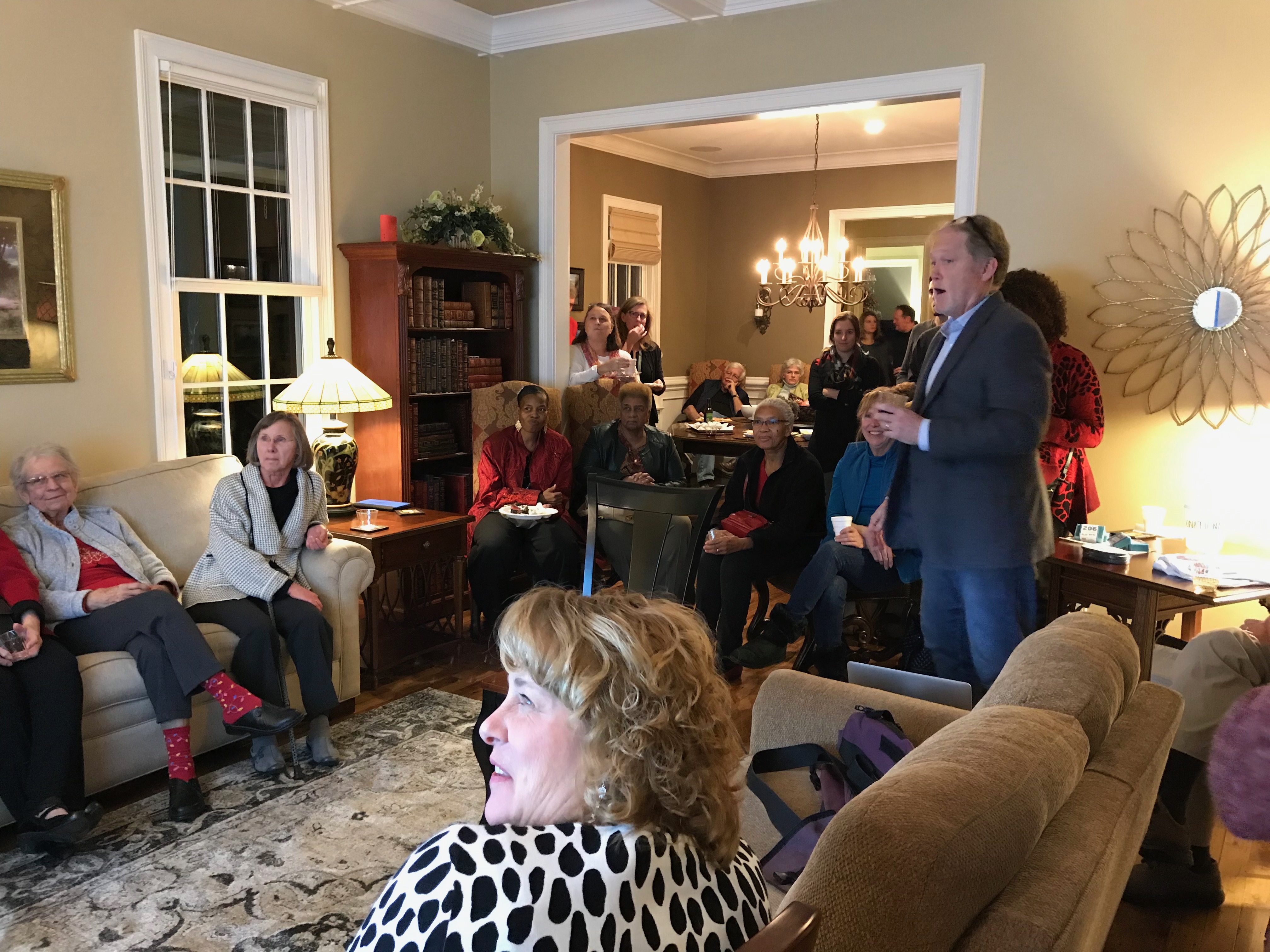 Speaker addressing a grassroots house meeting